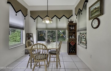 Such a beautiful home to enjoy from the gorgeous front door, and on Glen Lakes Country Club in Florida - for sale on GolfHomes.com, golf home, golf lot