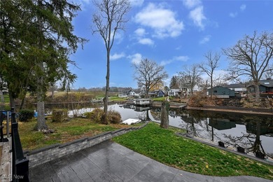 Experience the pinnacle of modern lakefront luxury. This on Turkeyfoot Lake Golf Links in Ohio - for sale on GolfHomes.com, golf home, golf lot