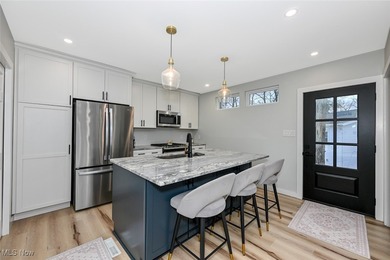 Experience the pinnacle of modern lakefront luxury. This on Turkeyfoot Lake Golf Links in Ohio - for sale on GolfHomes.com, golf home, golf lot