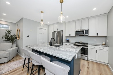 Experience the pinnacle of modern lakefront luxury. This on Turkeyfoot Lake Golf Links in Ohio - for sale on GolfHomes.com, golf home, golf lot