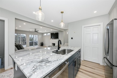 Experience the pinnacle of modern lakefront luxury. This on Turkeyfoot Lake Golf Links in Ohio - for sale on GolfHomes.com, golf home, golf lot