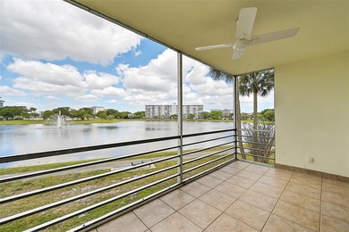 Immediately as you enter the foyer of this BRAND NEW renovated on Palm-Aire Country Club and Resort - Palms in Florida - for sale on GolfHomes.com, golf home, golf lot