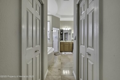Such a beautiful home to enjoy from the gorgeous front door, and on Glen Lakes Country Club in Florida - for sale on GolfHomes.com, golf home, golf lot