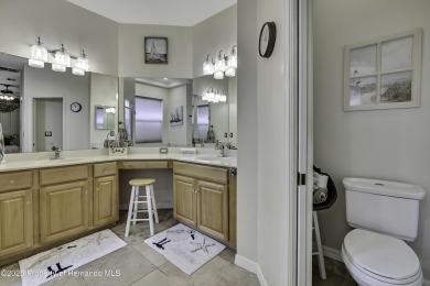 Such a beautiful home to enjoy from the gorgeous front door, and on Glen Lakes Country Club in Florida - for sale on GolfHomes.com, golf home, golf lot