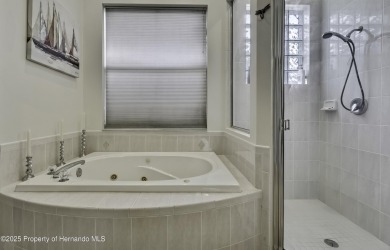 Such a beautiful home to enjoy from the gorgeous front door, and on Glen Lakes Country Club in Florida - for sale on GolfHomes.com, golf home, golf lot