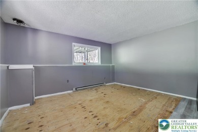 This very well maintained home is ready to be loved by its new on Pocono Farms Country Club in Pennsylvania - for sale on GolfHomes.com, golf home, golf lot