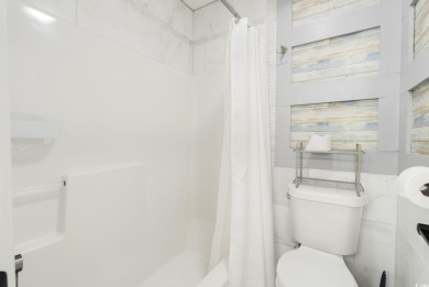 This beautiful beach condo located at River Oaks Golf Plantation on  in South Carolina - for sale on GolfHomes.com, golf home, golf lot