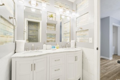 This beautiful beach condo located at River Oaks Golf Plantation on  in South Carolina - for sale on GolfHomes.com, golf home, golf lot