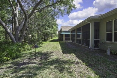Such a beautiful home to enjoy from the gorgeous front door, and on Glen Lakes Country Club in Florida - for sale on GolfHomes.com, golf home, golf lot