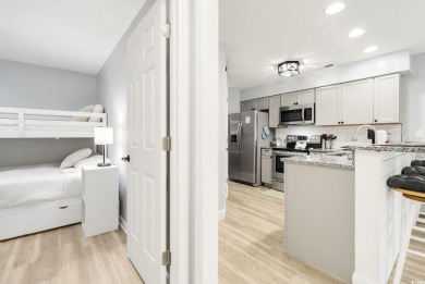 This beautiful beach condo located at River Oaks Golf Plantation on  in South Carolina - for sale on GolfHomes.com, golf home, golf lot