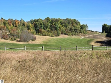 Beautifully wooded one acre lot -  sweeping views of golf course on Champion Hill Golf Club in Michigan - for sale on GolfHomes.com, golf home, golf lot