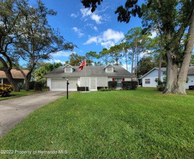 This wonderful home is nestled in a Cul de sac with shaded oak on Timber Pines Golf Course in Florida - for sale on GolfHomes.com, golf home, golf lot