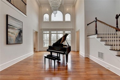 Welcome to an extraordinary estate perfectly positioned on Hole on Chateau Elan Golf Club  in Georgia - for sale on GolfHomes.com, golf home, golf lot