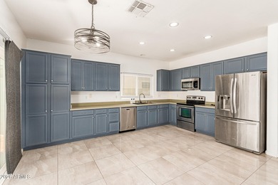 This spacious 5-bedroom home blends comfort, functionality, and on Wigwam Golf  Resort Litchfield Park  in Arizona - for sale on GolfHomes.com, golf home, golf lot