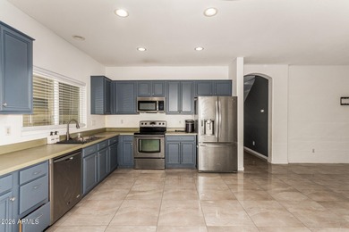 This spacious 5-bedroom home blends comfort, functionality, and on Wigwam Golf  Resort Litchfield Park  in Arizona - for sale on GolfHomes.com, golf home, golf lot