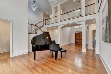 Welcome to an extraordinary estate perfectly positioned on Hole on Chateau Elan Golf Club  in Georgia - for sale on GolfHomes.com, golf home, golf lot