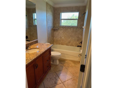 Large home with 5 bedrooms and 3.5 bathrooms priced to sell! on Stoneybrook Golf Club At Heritage Harbour in Florida - for sale on GolfHomes.com, golf home, golf lot