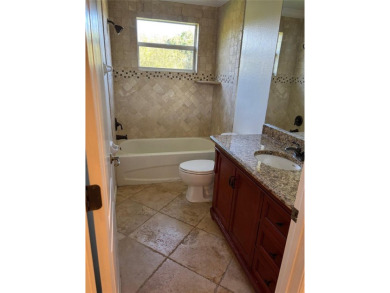 Large home with 5 bedrooms and 3.5 bathrooms priced to sell! on Stoneybrook Golf Club At Heritage Harbour in Florida - for sale on GolfHomes.com, golf home, golf lot