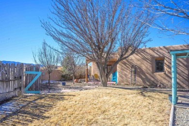 Charming Adobe Pumice Home with Expansive Mountain Views on Taos Country Club in New Mexico - for sale on GolfHomes.com, golf home, golf lot