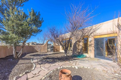 Charming Adobe Pumice Home with Expansive Mountain Views on Taos Country Club in New Mexico - for sale on GolfHomes.com, golf home, golf lot