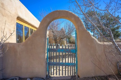 Charming Adobe Pumice Home with Expansive Mountain Views on Taos Country Club in New Mexico - for sale on GolfHomes.com, golf home, golf lot