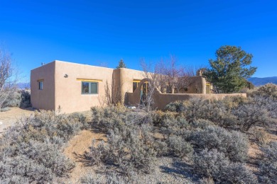 Charming Adobe Pumice Home with Expansive Mountain Views on Taos Country Club in New Mexico - for sale on GolfHomes.com, golf home, golf lot