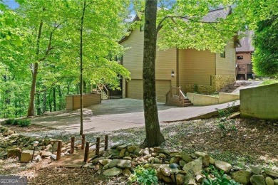Welcome to The Wolf Den, a masterfully remodeled mountain on Bent Tree Golf Course in Georgia - for sale on GolfHomes.com, golf home, golf lot
