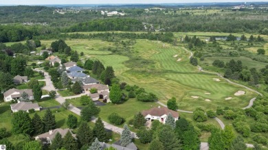 Enjoy country club living in Arrowhead Estates, a golf course on Grand Traverse Resort and Spa in Michigan - for sale on GolfHomes.com, golf home, golf lot