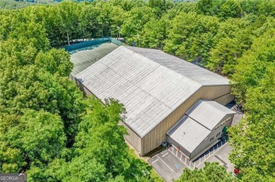 Welcome to The Wolf Den, a masterfully remodeled mountain on Bent Tree Golf Course in Georgia - for sale on GolfHomes.com, golf home, golf lot