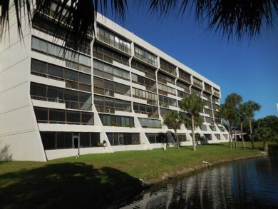 4th FLOOR CONDO WITH SOUTH EXPOSURE OFF THE SCREENED BALCONY on The Country Club At Boca Raton in Florida - for sale on GolfHomes.com, golf home, golf lot