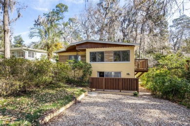 Distinctive mid-century Modern home in the historic Golf View on Mark Bostick Golf Course At University of Florida in Florida - for sale on GolfHomes.com, golf home, golf lot