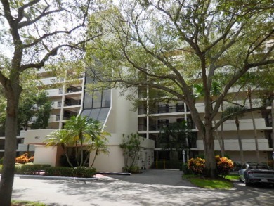 4th FLOOR CONDO WITH SOUTH EXPOSURE OFF THE SCREENED BALCONY on The Country Club At Boca Raton in Florida - for sale on GolfHomes.com, golf home, golf lot