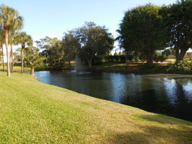 4th FLOOR CONDO WITH SOUTH EXPOSURE OFF THE SCREENED BALCONY on The Country Club At Boca Raton in Florida - for sale on GolfHomes.com, golf home, golf lot