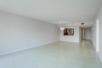 4th FLOOR CONDO WITH SOUTH EXPOSURE OFF THE SCREENED BALCONY on The Country Club At Boca Raton in Florida - for sale on GolfHomes.com, golf home, golf lot