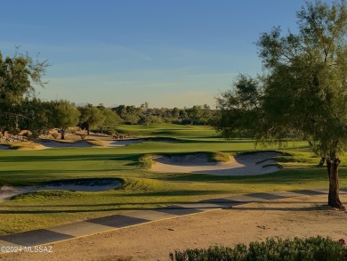 Nestled within the prestigious Omni Tucson National community on Omni Tucson National Golf Resort and Spa - Sonoran in Arizona - for sale on GolfHomes.com, golf home, golf lot