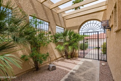 Nestled within the prestigious Omni Tucson National community on Omni Tucson National Golf Resort and Spa - Sonoran in Arizona - for sale on GolfHomes.com, golf home, golf lot