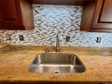 Enjoy the expansive golf course views from this spacious 3 on Tara Golf and Country Club in Florida - for sale on GolfHomes.com, golf home, golf lot