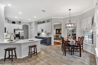 Exquisite 5BR/4BA home with 3,142 SF in Eagle Harbor on a on Eagle Harbor Golf Club in Florida - for sale on GolfHomes.com, golf home, golf lot