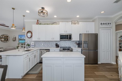 Tucked away on a quiet street with peaceful pond views, this on Heritage Springs Country Club in Florida - for sale on GolfHomes.com, golf home, golf lot