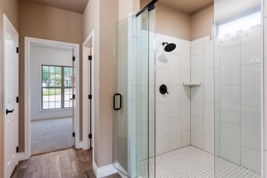 Stunning new construction in the gated Meadow Lakes Golf Club on Hidden Falls Golf Club in Texas - for sale on GolfHomes.com, golf home, golf lot