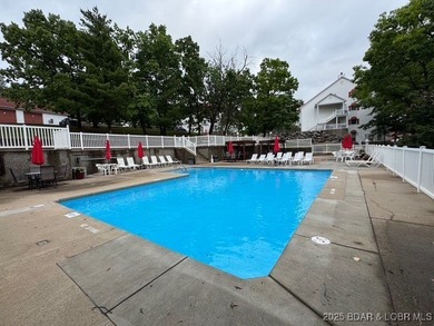 Charming Lakefront Condo in a Small, Sought-After Community! on Seasons Ridge At Four Seasons in Missouri - for sale on GolfHomes.com, golf home, golf lot