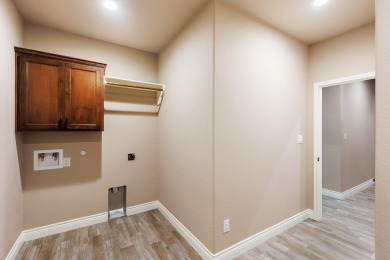 Stunning new construction in the gated Meadow Lakes Golf Club on Hidden Falls Golf Club in Texas - for sale on GolfHomes.com, golf home, golf lot