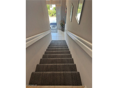 WELCOME HOME! ENJOY SPECTACULAR LAKE & SUNRISE VIEWS from your on Colonial Country Club in Florida - for sale on GolfHomes.com, golf home, golf lot