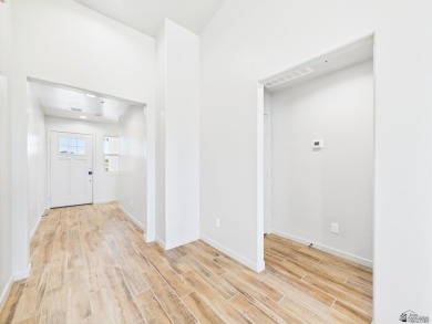 Welcome to this beautifully crafted townhome, ideally situated on Mesa Del Sol Golf Club in Arizona - for sale on GolfHomes.com, golf home, golf lot