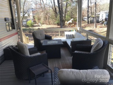 Welcome to your perfect getaway in Twin Harbor on Lake Tillery on The Tillery Tradition Country Club in North Carolina - for sale on GolfHomes.com, golf home, golf lot