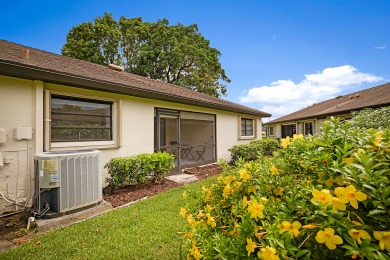 Beautifully remodeled 2/2 villae see this light and bright villa on Pine Tree Golf Club in Florida - for sale on GolfHomes.com, golf home, golf lot