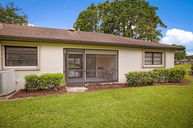 Beautifully remodeled 2/2 villae see this light and bright villa on Pine Tree Golf Club in Florida - for sale on GolfHomes.com, golf home, golf lot