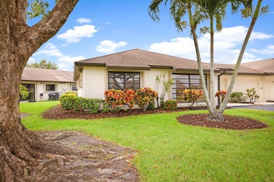 Beautifully remodeled 2/2 villae see this light and bright villa on Pine Tree Golf Club in Florida - for sale on GolfHomes.com, golf home, golf lot