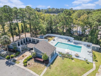 Welcome to your new oasis in the desirable Windjammer Village on Indian Wells Golf Course in South Carolina - for sale on GolfHomes.com, golf home, golf lot