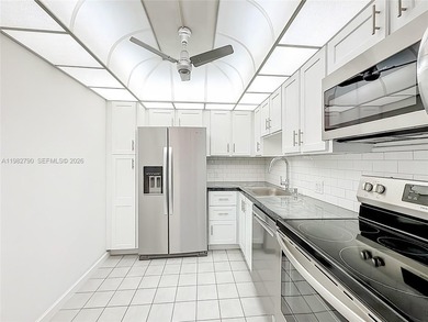 Enjoy unobstructed panoramic views of the Turnberry golf course on Turnberry Isle Resort and Club in Florida - for sale on GolfHomes.com, golf home, golf lot